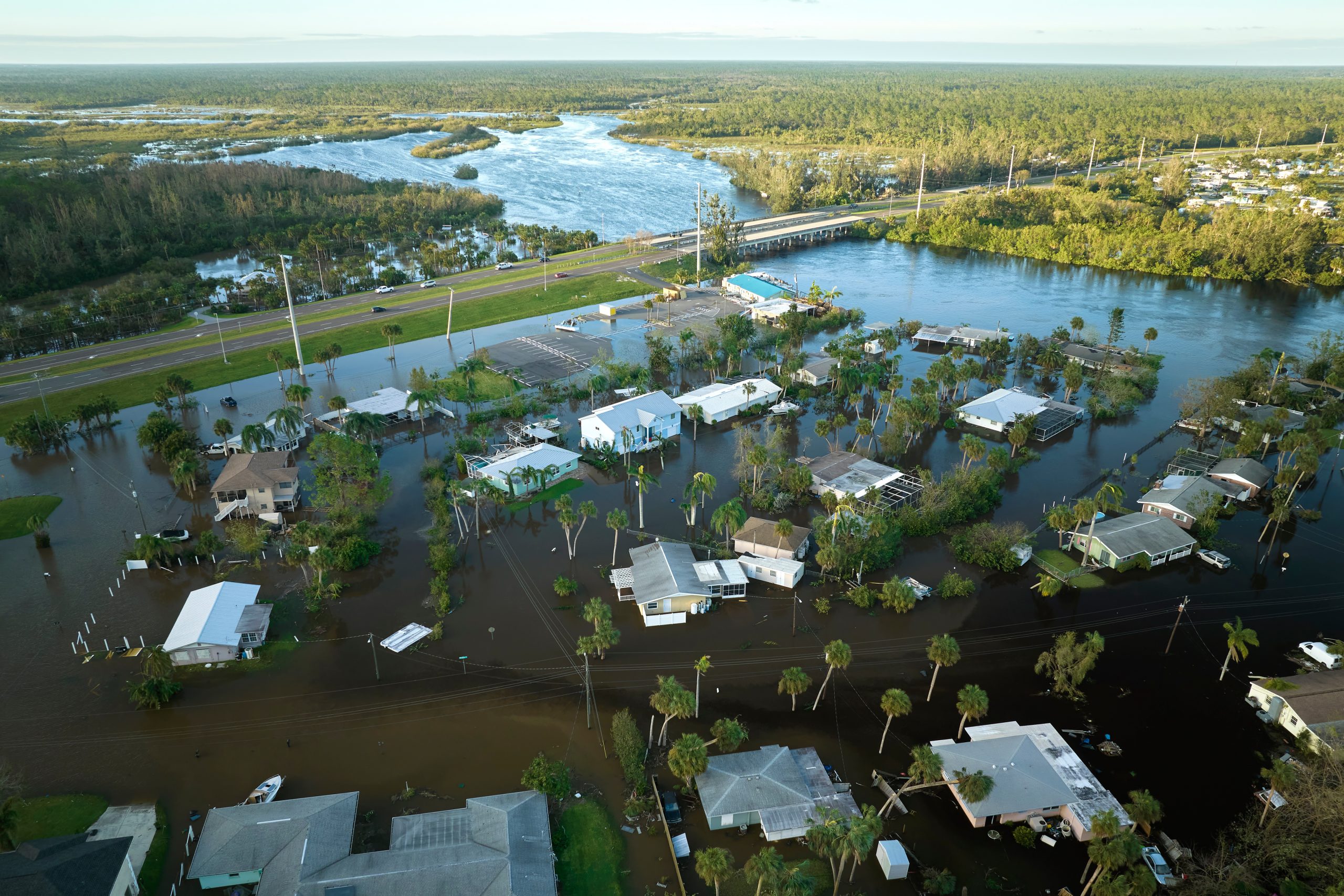 Aerial view of flooded neighborhood after Hurricane Ian, showing why hurricane preparedness for water systems matters for storm-prone communities